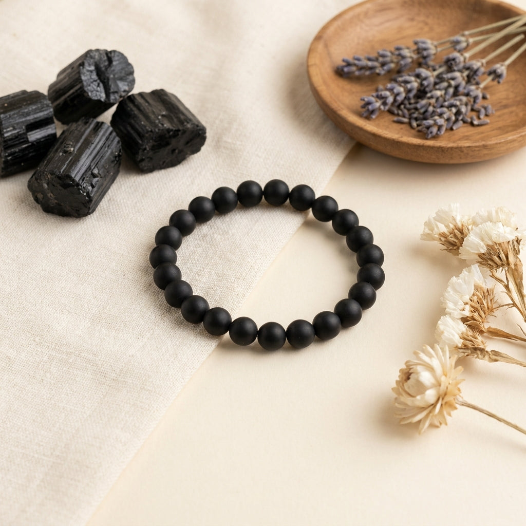 Black Tourmaline Protection Bracelet - styled flat lay