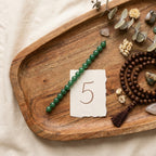 Number 5 Mercury Numerology Bracelet - styled flat lay