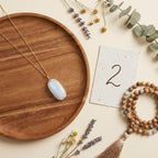 Number 2 Moon Numerology Pendant - styled flat lay