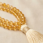 Pisces Jupiter Zodiac Mala - macro detail of citrine beads