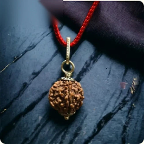 Nityara 5 Mukhi Rudraksha Silver Cap Pendant on traditional red thread hero view