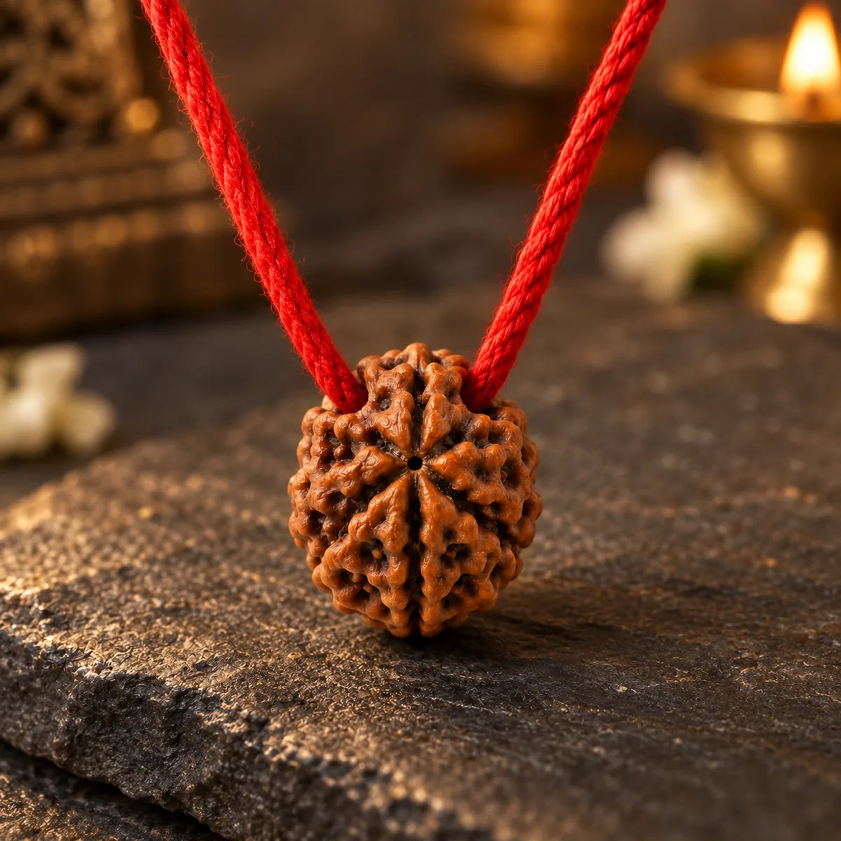 7 Mukhi Rudraksha Thread Pendant macro detail showing seven natural grooves
