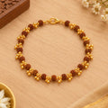 Nityara Gold Plated Elemental Rudraksha Bracelet for Women hero product view