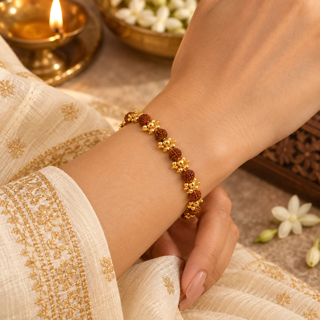 Gold Plated Elemental Rudraksha Bracelet for Women worn on wrist lifestyle view