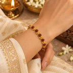 Gold Plated Elemental Rudraksha Bracelet for Women worn on wrist lifestyle view