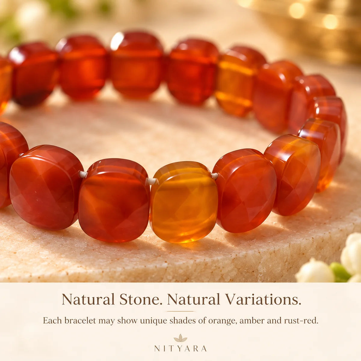 Natural Carnelian gemstone bead close-up showing genuine orange amber and reddish-brown colour variation