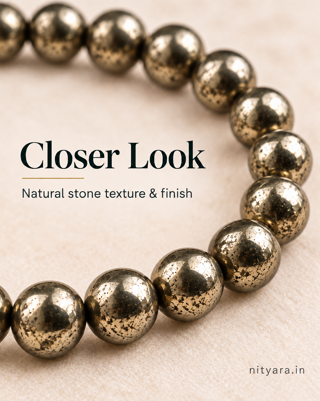 Close-up of polished natural Pyrite bracelet beads showing metallic texture and markings